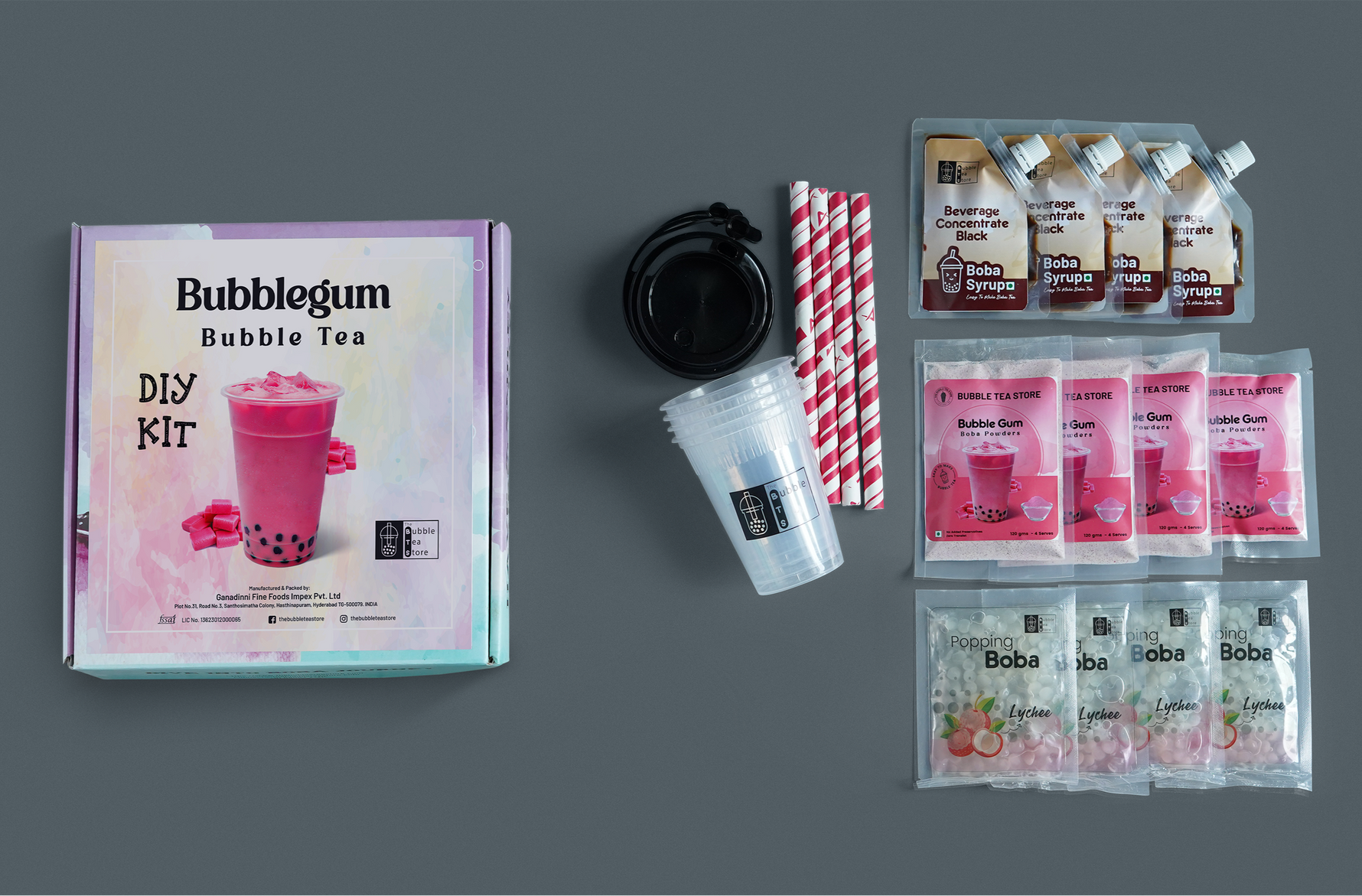 Bubble tea kit with box or Kit, cup, straws, and packets on gray background